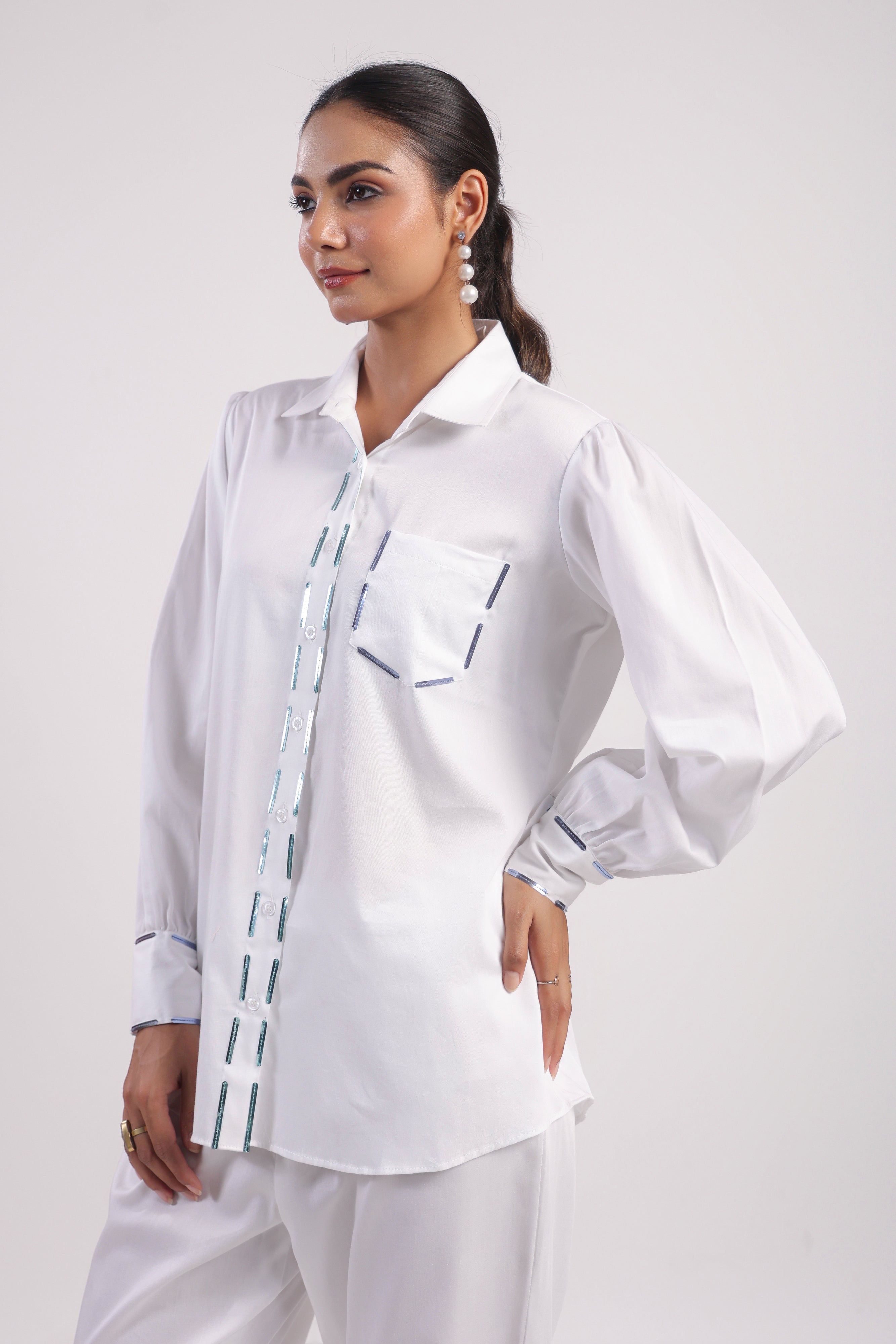 Shirt with metal strips