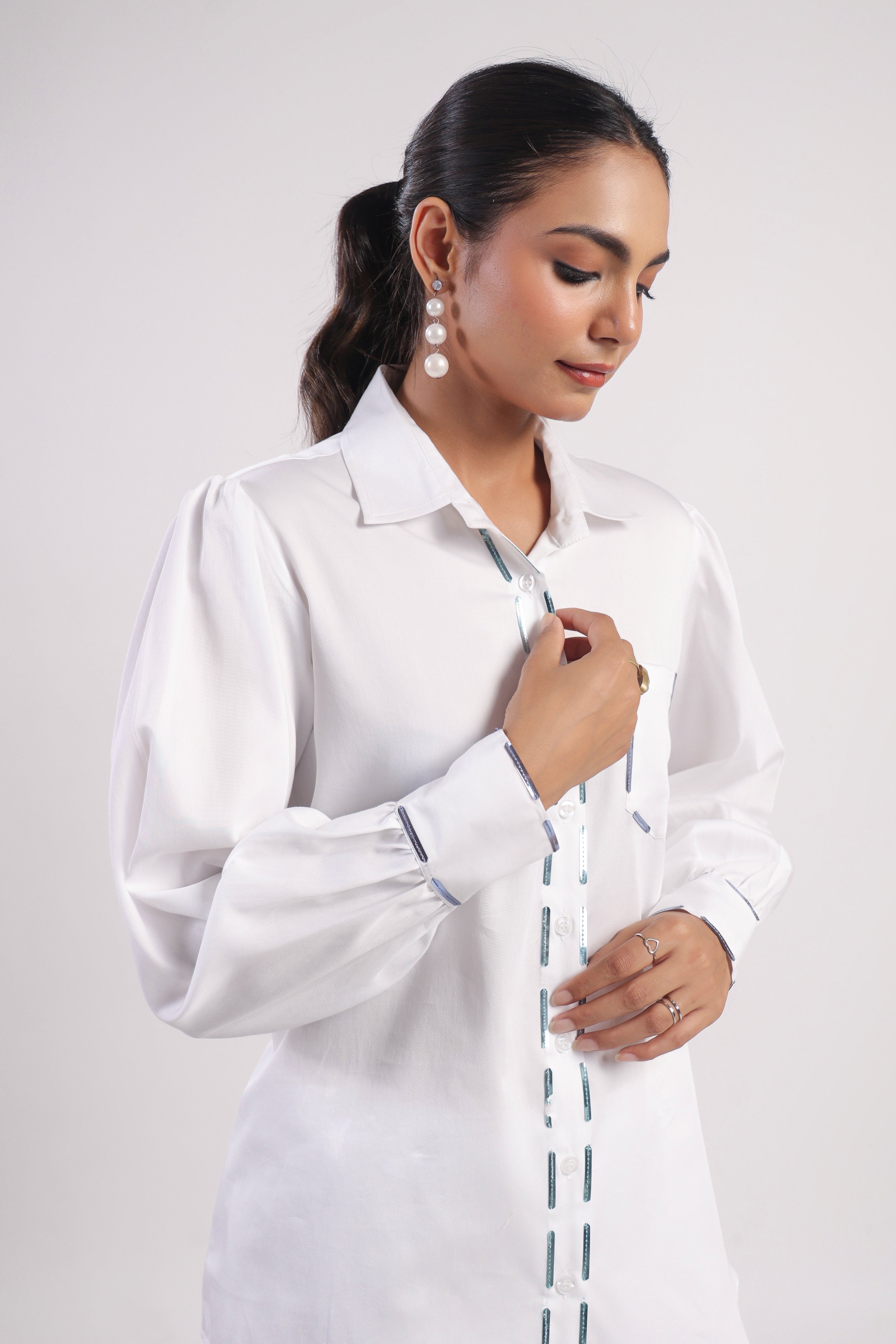 Shirt with metal strips